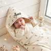 Hooded blanket named Anna with  smiling baby.
