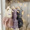 Cream, purple, and gray tank-top rompers with ruffled tutu bottoms, personalized with the names "Maeve," "Leah," and "Jenna"