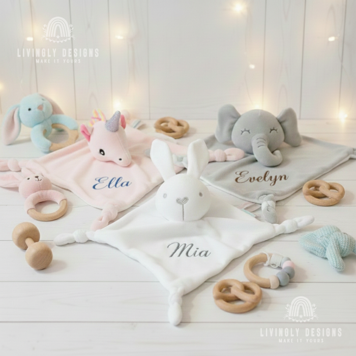 ink unicorn, white bunny, and grey elephant security blankets personalized with names Ella, Mia, and Evelyn