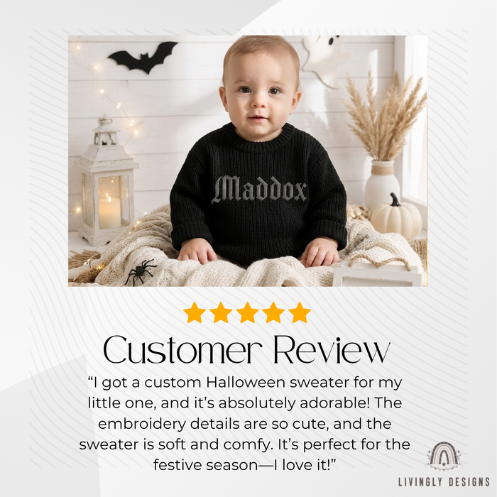 Customer review photo of a baby wearing a black knitted sweater personalized with the name "Maddox," sitting among Halloween decorations