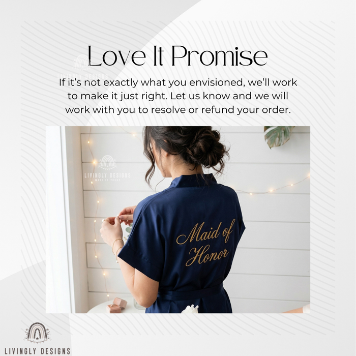 Woman wearing a navy satin robe embroidered with “Maid of Honor” on the back.