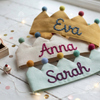 Three fabric crowns named Eva, Anna, and Sarah.