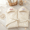 Two hooded blankets named Lucia and Sofia.