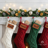 White, red, green, and red knit stockings with leather patches for "Daisy," "Hannah," "Stevie," and more