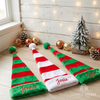 Striped elf hats with the names "Jenna," "Josie," and "Kylie"