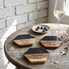 Three hexagonal marble and wood coasters engraved with the names "Ada," "Amy," and "Mia"