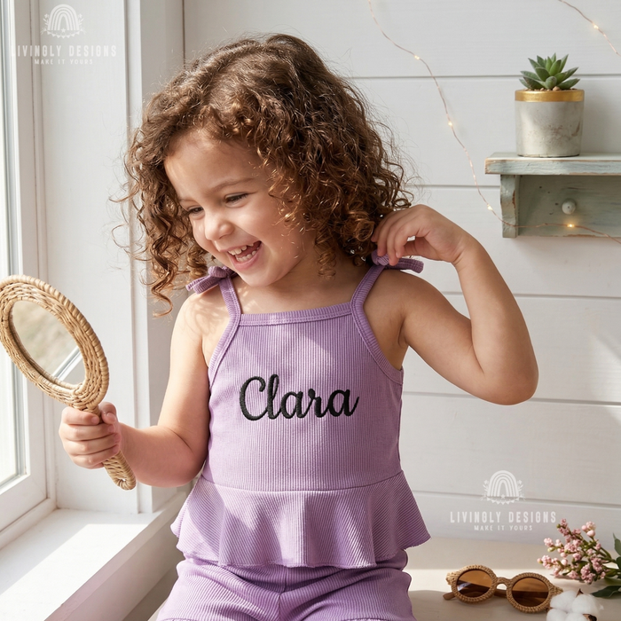 Girl wearing purple ribbed tank set named Clara