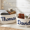 Woven rope storage baskets personalized with names Thomas and David