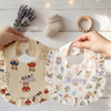 Ruffled bibs personalized with names Aria and Maeve