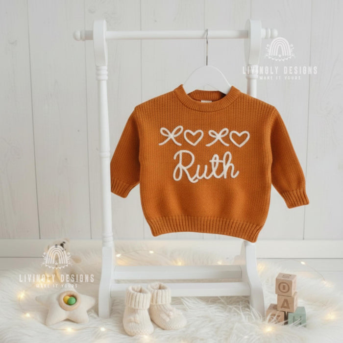 Personalized Baby Name Sweater with Bows & Hearts